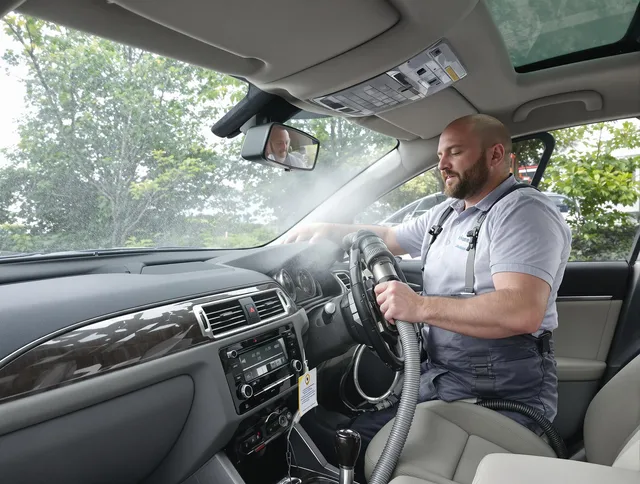 Whitman Air Duct Cleaning specialist performing professional car duct cleaning in Whitman