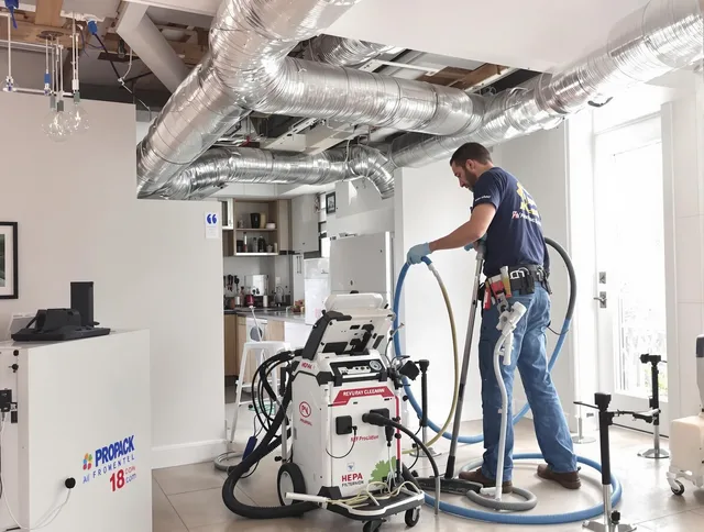 Whitman Air Duct Cleaning technician performing advanced pure duct cleaning with specialized equipment in Whitman
